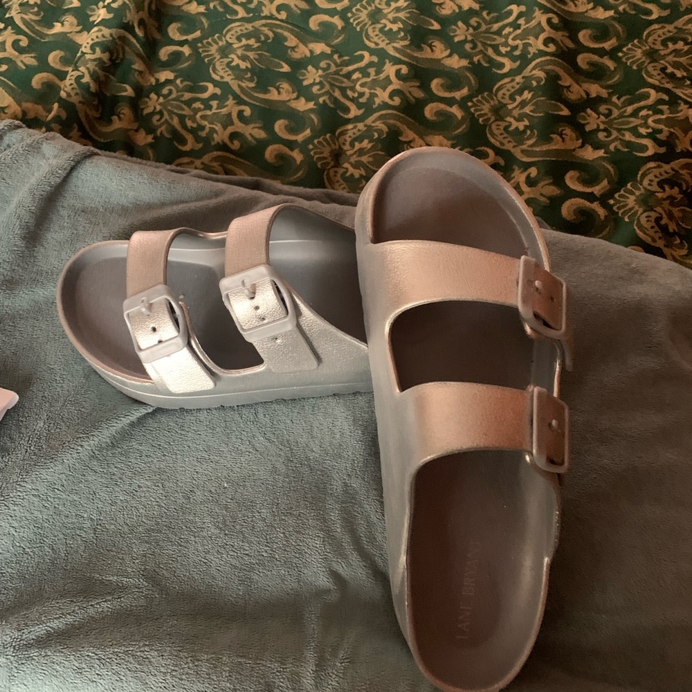 Lane Bryant Women’s silver sandals purchase today comes with free gift from me!😊
